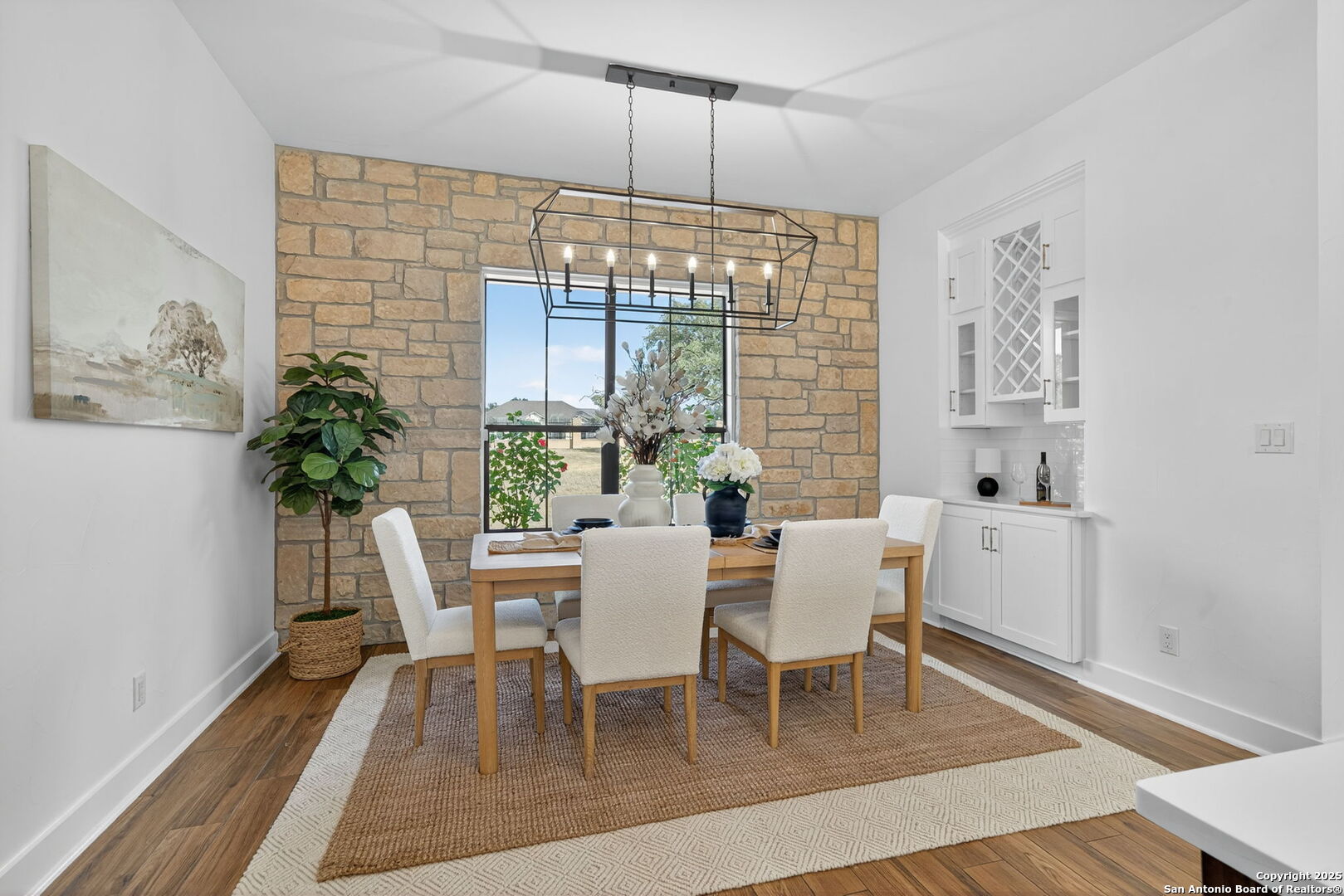 1115 Meadow Stone Court Spring Branch, TX 78070 - Photo 14 of 42 a view of a dining room with furniture window and wooden floor