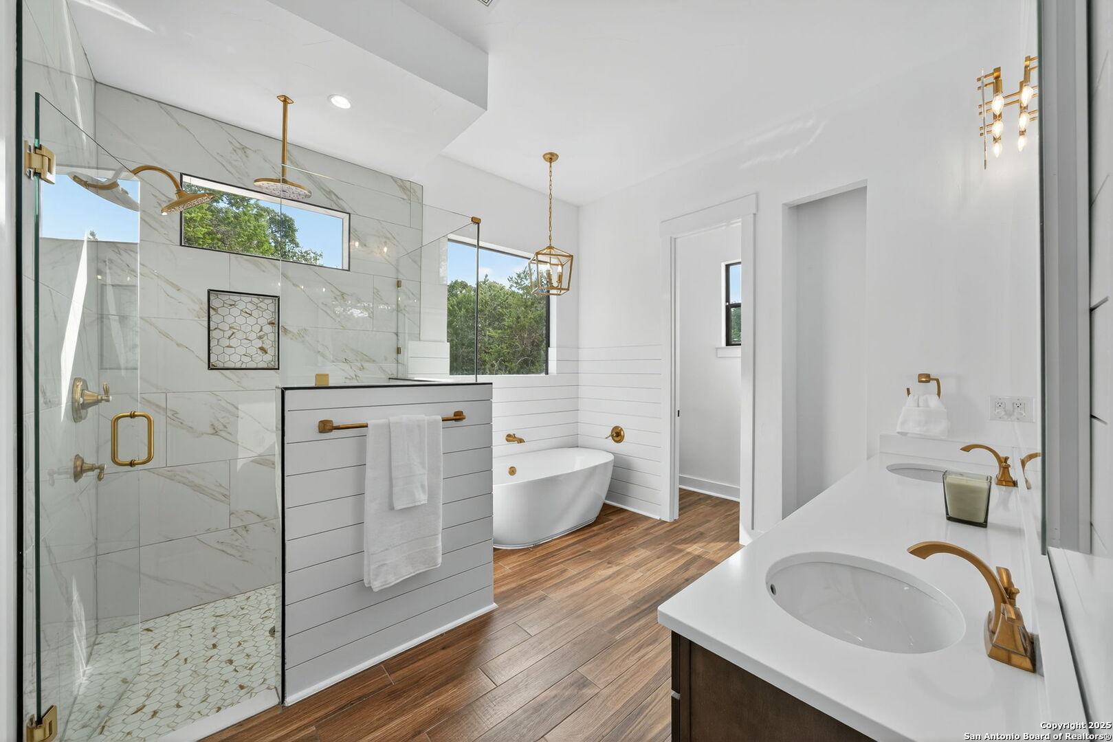 1115 Meadow Stone Court Spring Branch, TX 78070 - Photo 18 of 42 a bathroom with a granite countertop sink a toilet and shower