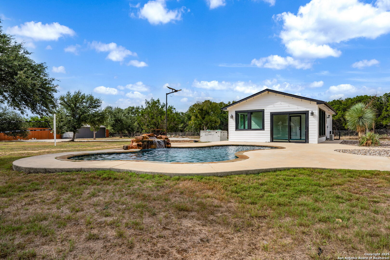 1115 Meadow Stone Court Spring Branch, TX 78070 - Photo 40 of 42 a view of pool with a yard