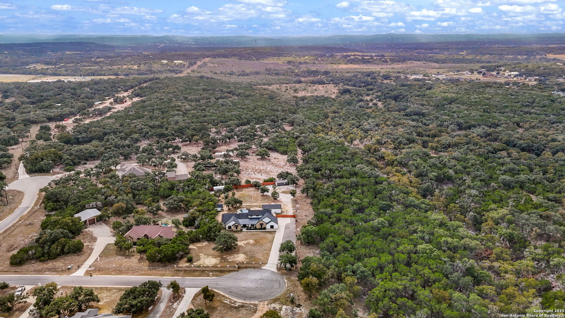 1115 Meadow Stone Court Spring Branch, TX 78070 - Photo 41 of 42 an aerial view of residential houses with outdoor space