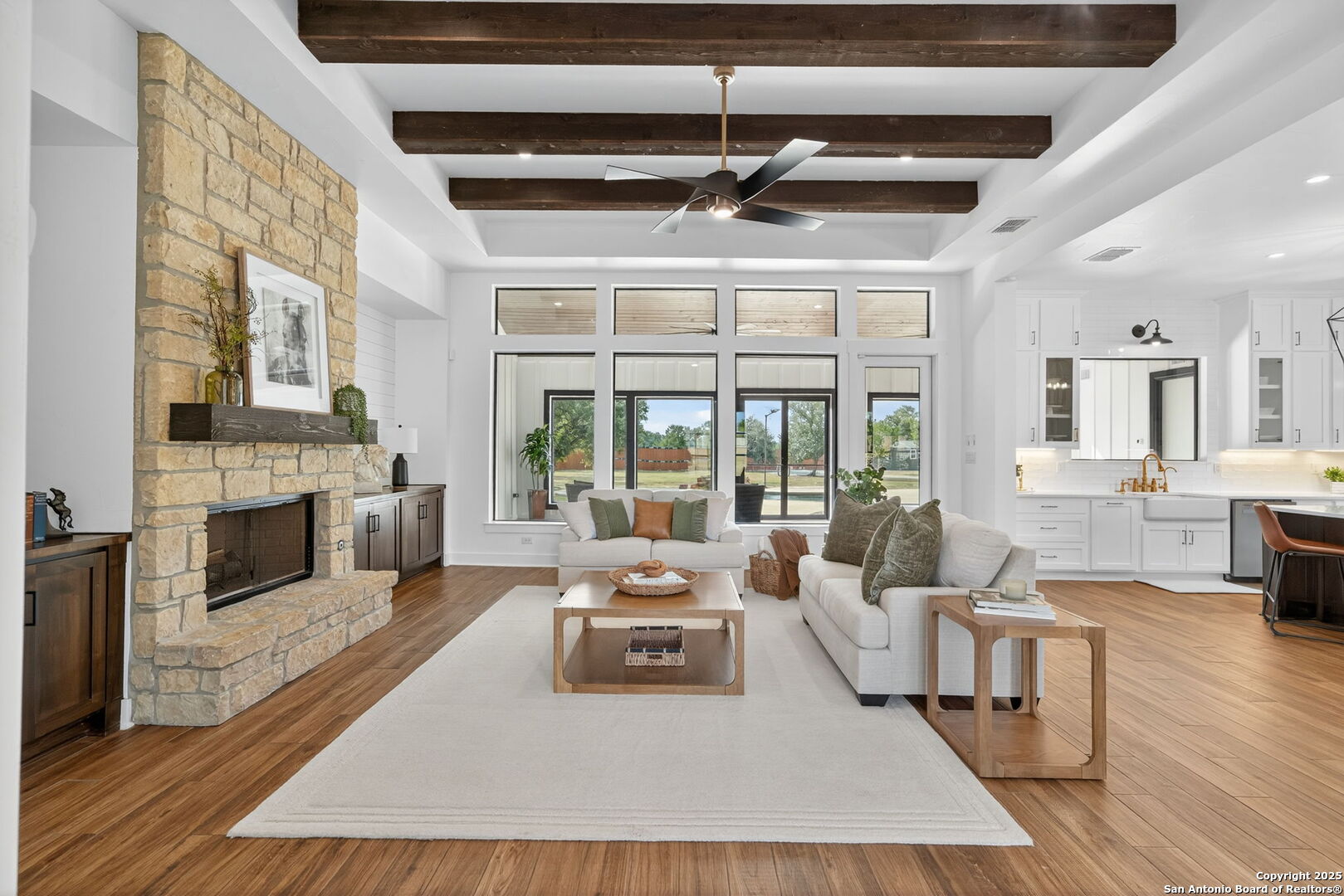 1115 Meadow Stone Court Spring Branch, TX 78070 - Photo 6 of 42 a living room with furniture large window and wooden floor