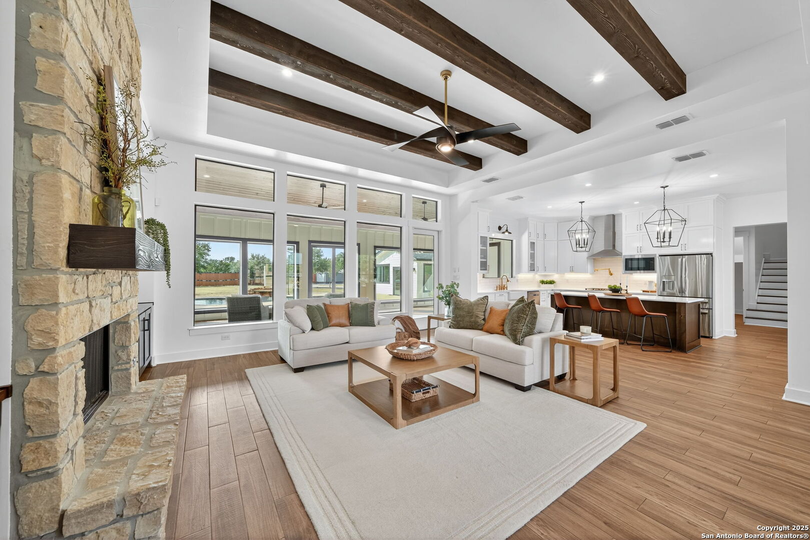 1115 Meadow Stone Court Spring Branch, TX 78070 - Photo 7 of 42 a living room with fireplace furniture and a flat screen tv