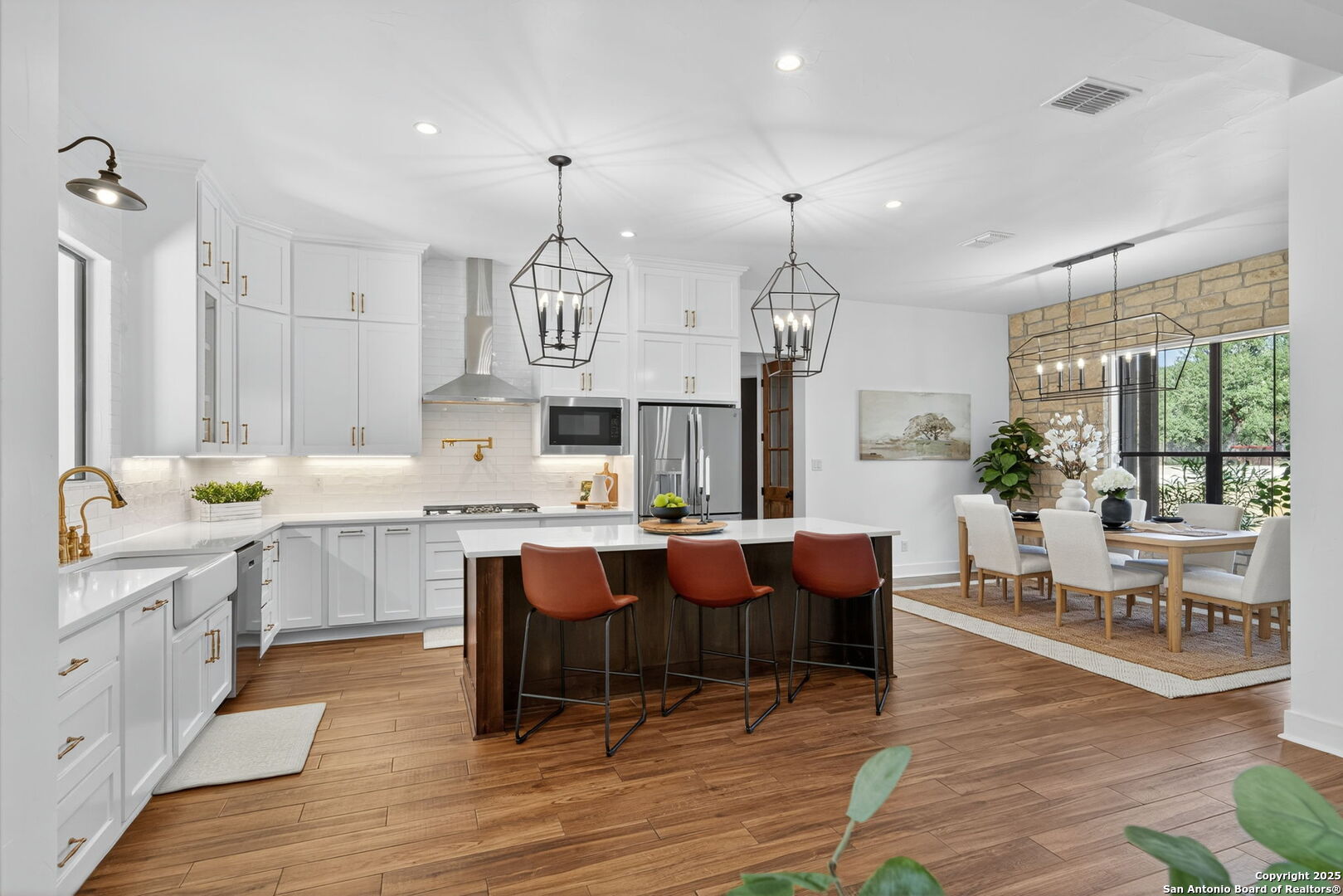 1115 Meadow Stone Court Spring Branch, TX 78070 - Photo 9 of 42 a large kitchen with a table and chairs in it