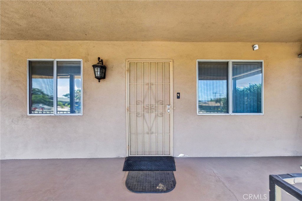 29078 Bradley Road Menifee, CA 92586 - Photo 6 of 42 a view of a potted plant in front of a bathroom