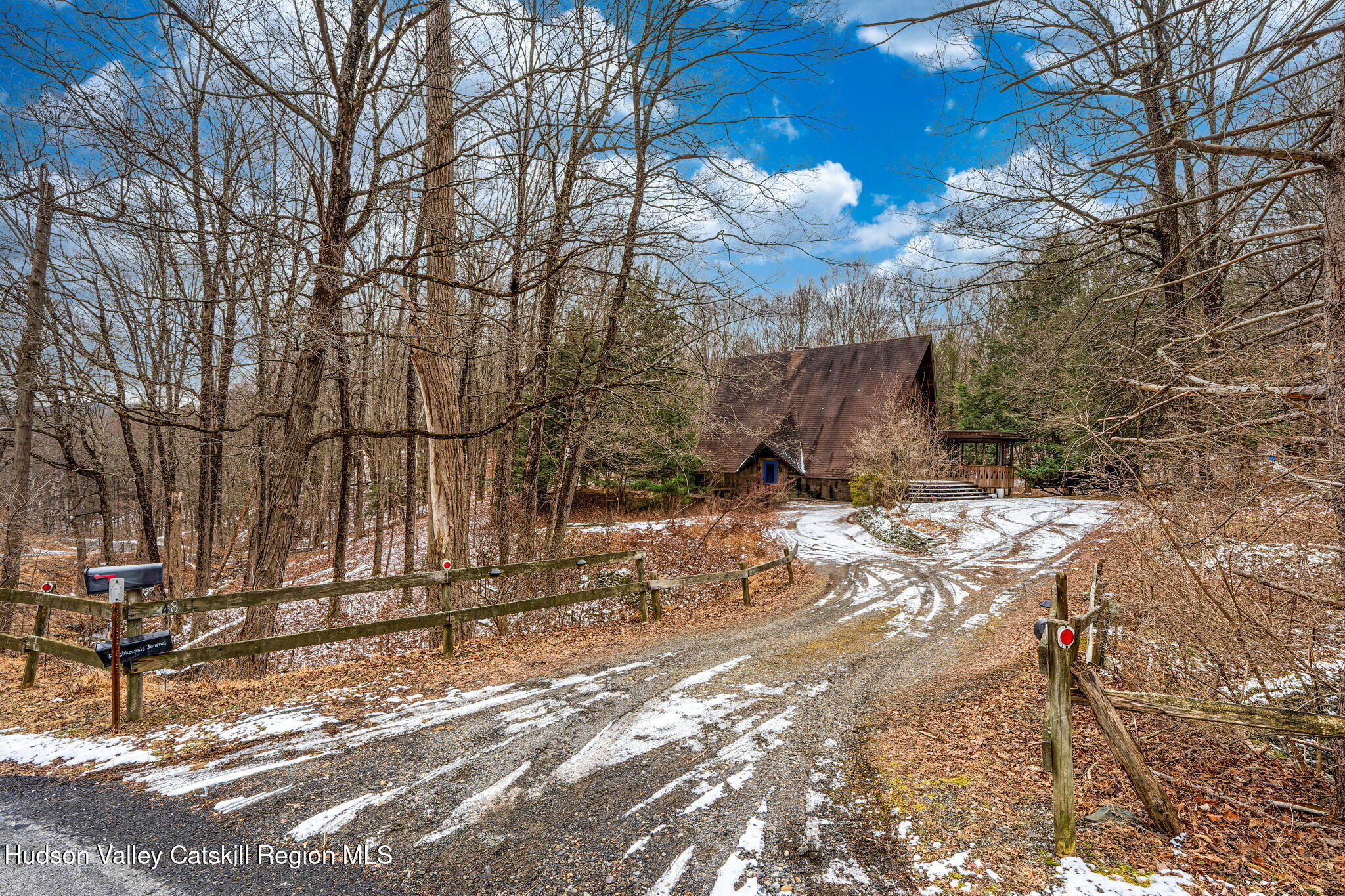348 Willow Glen Road Red Hook, NY 12571 - Photo 24 of 29 a view of a yard with snow on the road