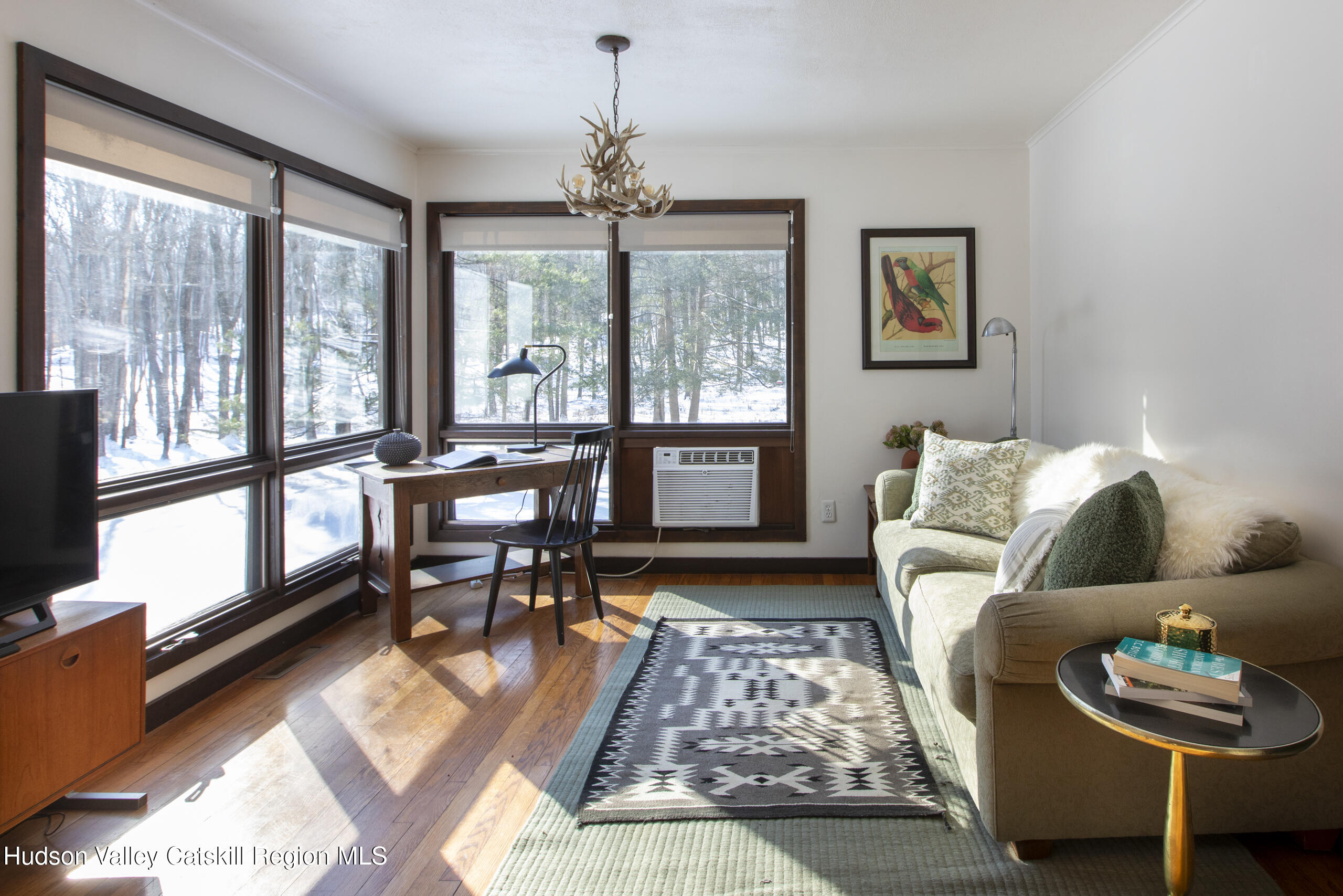 348 Willow Glen Road Red Hook, NY 12571 - Photo 7 of 29 a living room with furniture and a large window