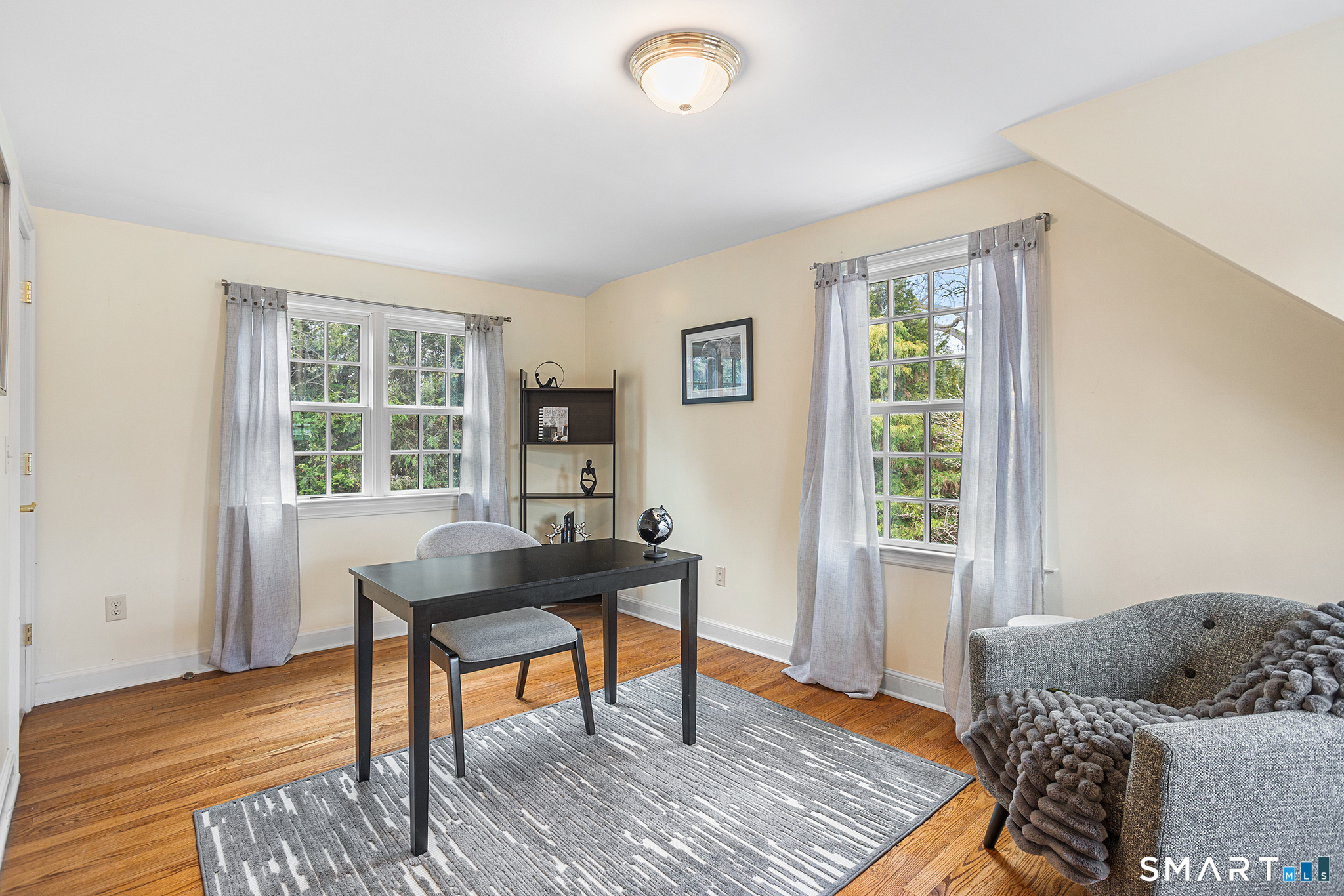 104 Putting Green Road Fairfield, CT 06825 - Photo 23 of 35 a workspace with furniture and a window