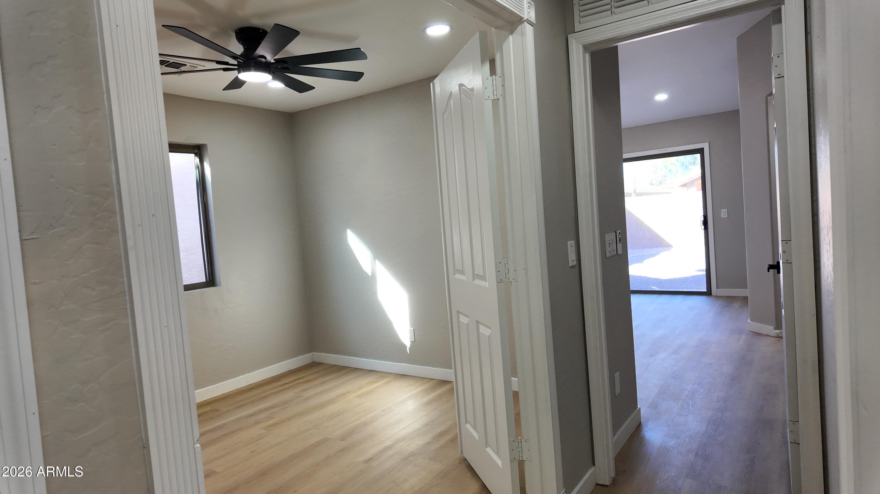 1522 East Chambers Street Phoenix, AZ 85040 - Photo 14 of 29 a view of hallway with wooden floor