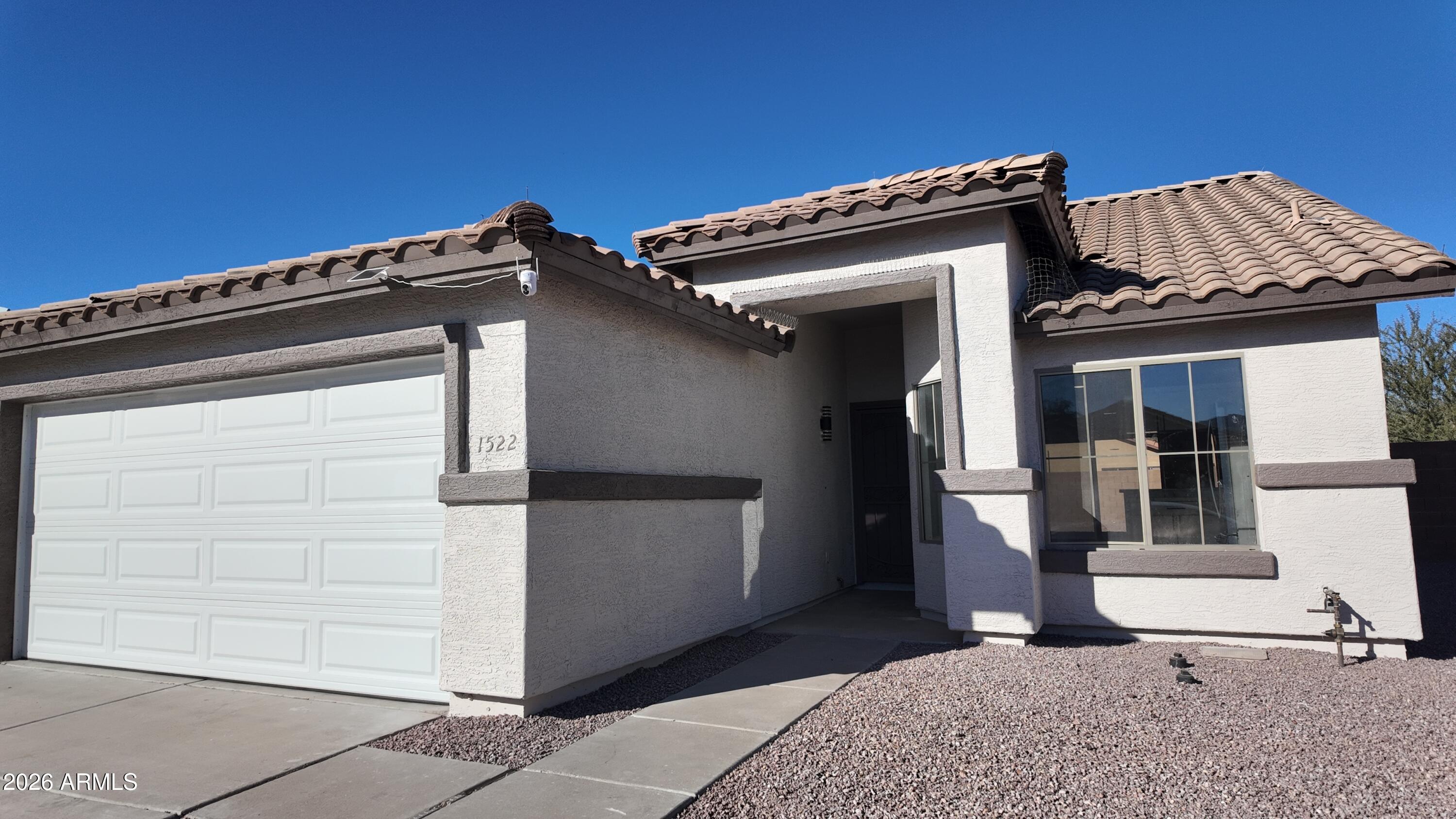 1522 East Chambers Street Phoenix, AZ 85040 - Photo 2 of 29 a view of a house with large windows