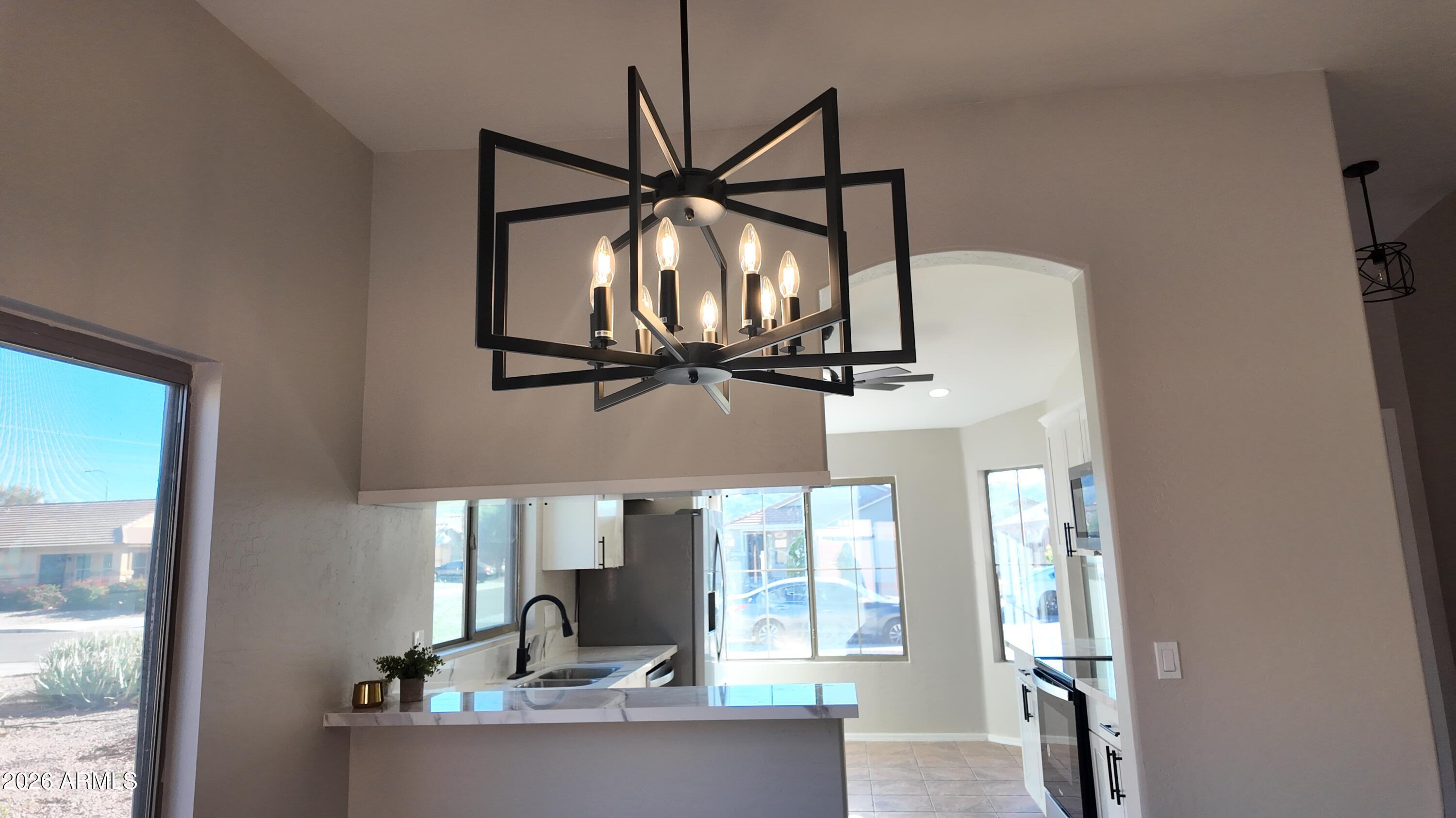 1522 East Chambers Street Phoenix, AZ 85040 - Photo 7 of 29 a view of a livingroom with furniture and window