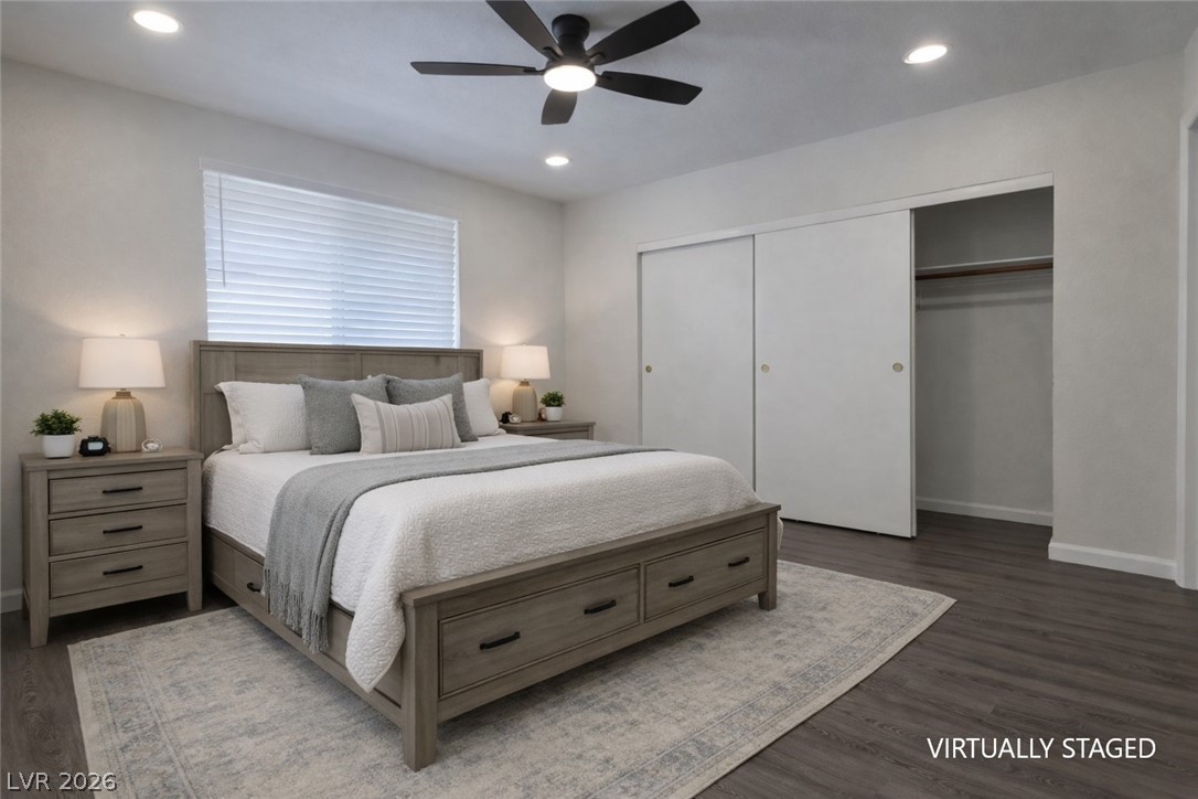 7570 West Flamingo Road, Unit 209 Las Vegas, NV 89147 - Photo 14 of 30 Bedroom featuring a closet, dark wood finished floors, ceiling fan, and recessed lighting