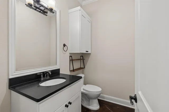a bathroom with a sink and a toilet