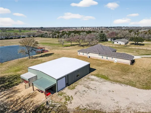 a view of a swimming pool with an ocean view