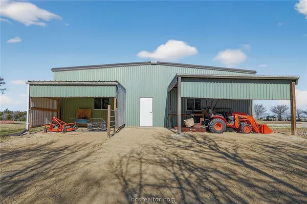 a bedroom with furniture and a bed