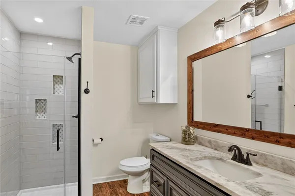 a bed room with a bed and a window