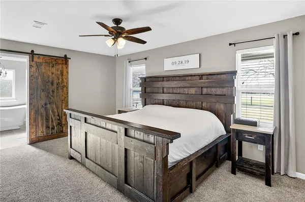 a white bath tub sitting in a bathroom