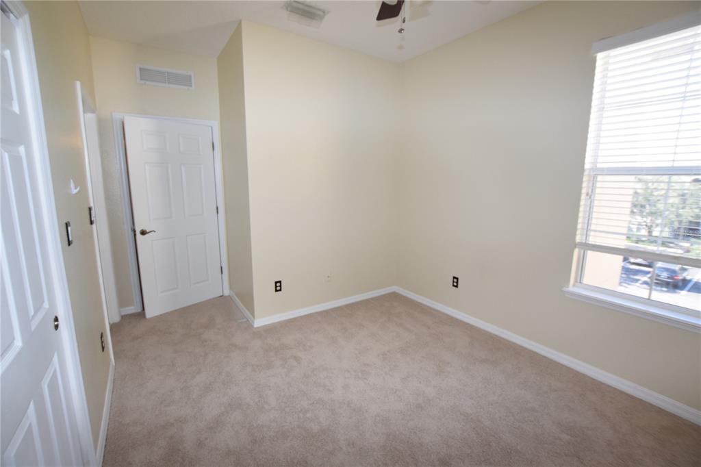8168 Boat Hook Loop, Unit 725 Windermere, FL 34786 - Photo 11 of 35 a view of an empty room with a window