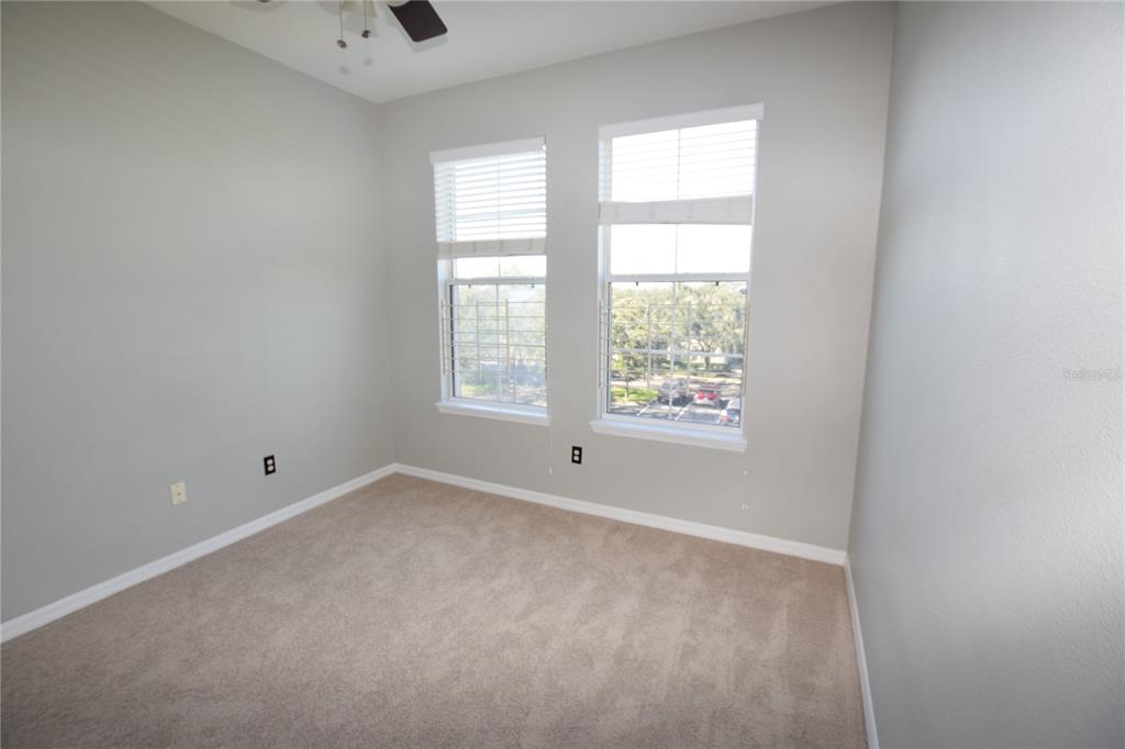 8168 Boat Hook Loop, Unit 725 Windermere, FL 34786 - Photo 15 of 35 an empty room with windows