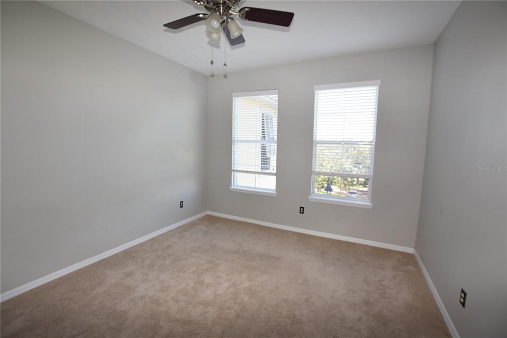 8168 Boat Hook Loop, Unit 725 Windermere, FL 34786 - Photo 18 of 35 an empty room with a window