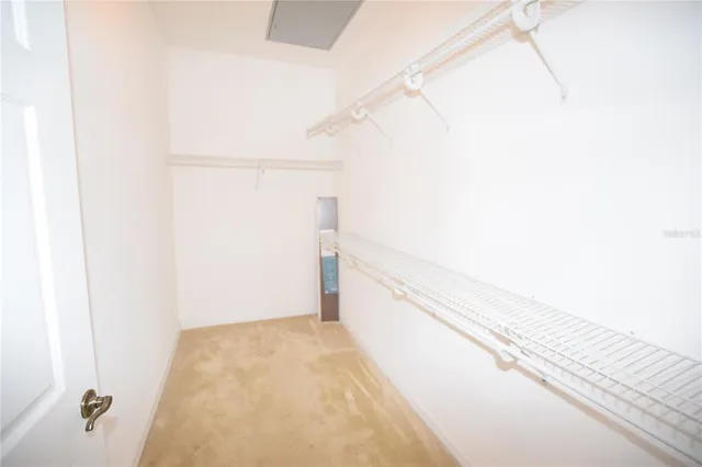 a kitchen with stainless steel appliances a stove microwave and sink