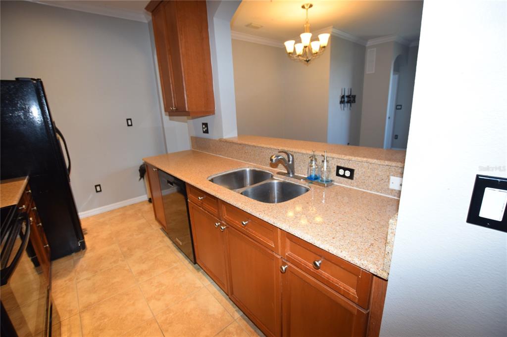 8168 Boat Hook Loop, Unit 725 Windermere, FL 34786 - Photo 27 of 35 a bathroom with a sink and a mirror