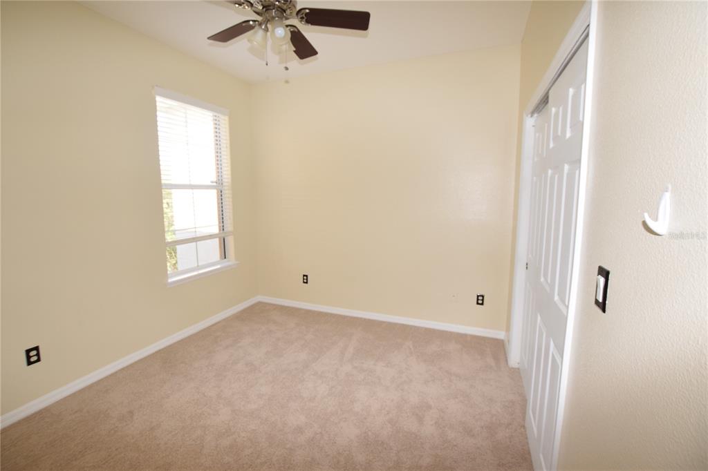8168 Boat Hook Loop, Unit 725 Windermere, FL 34786 - Photo 10 of 35 a view of an empty room with a window