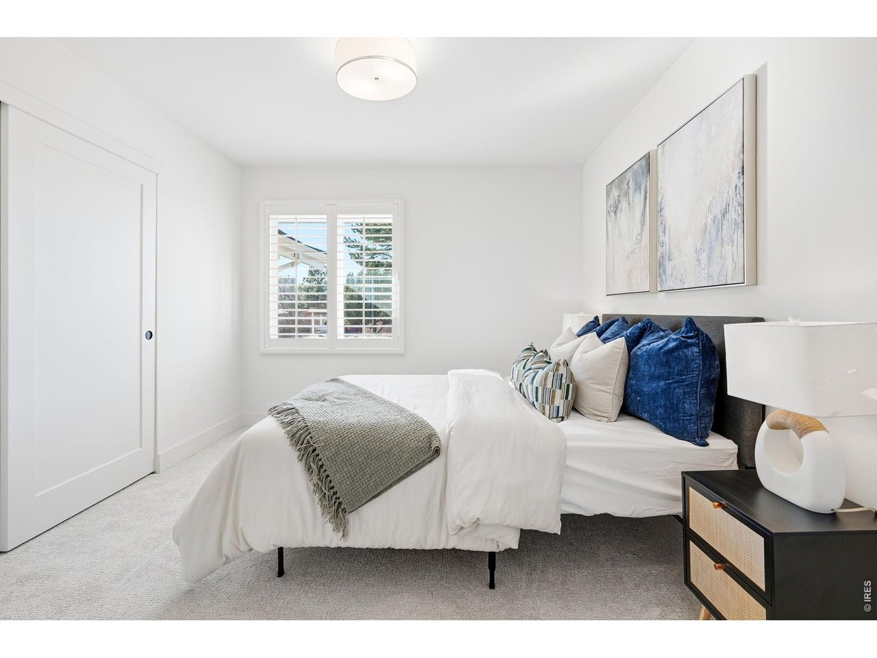 4788 Briar Ridge Trail Boulder, CO 80301 - Photo 22 of 45 Spacious secondary bedroom located on the main level, featuring ample natural light and versatile living space.