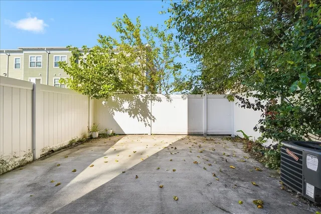 a view of a house with a tree