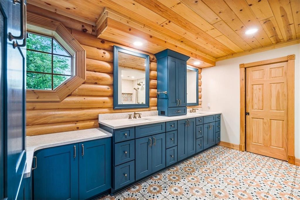 239 Christy Road Eighty Four, PA 15330 - Photo 14 of 50 a bathroom with a sink mirror and a shower