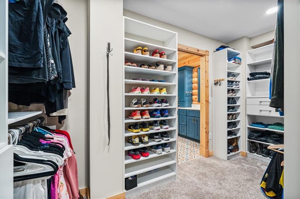 239 Christy Road Eighty Four, PA 15330 - Photo 18 of 50 a view of walk in closet with clothes and shoes