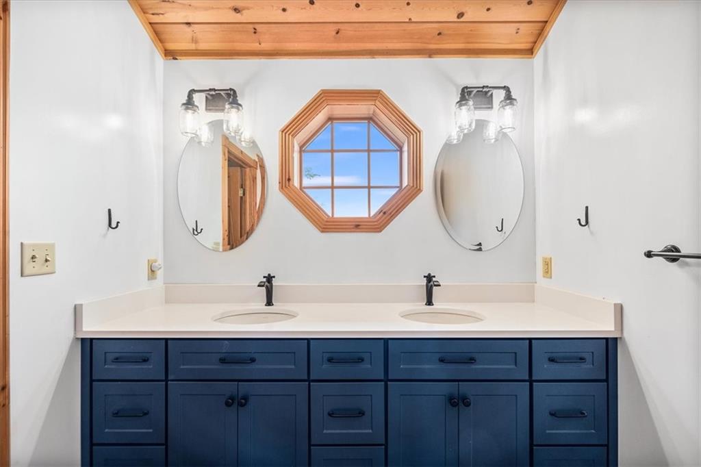 239 Christy Road Eighty Four, PA 15330 - Photo 25 of 50 a bathroom with a double vanity sink and a mirror