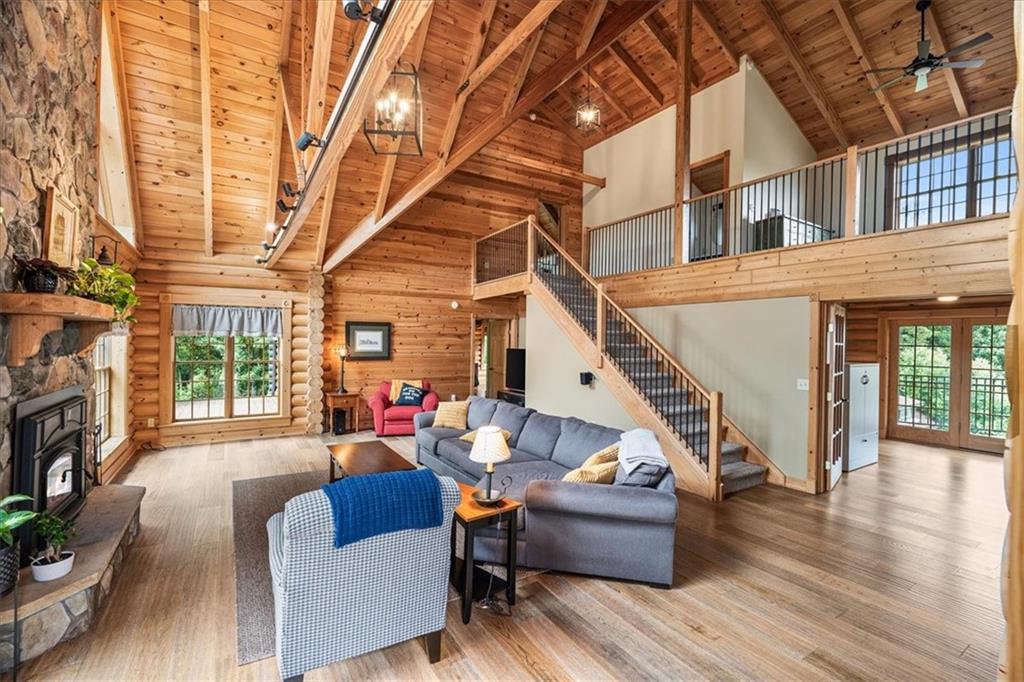 239 Christy Road Eighty Four, PA 15330 - Photo 5 of 50 a living room with furniture a fireplace and a large window