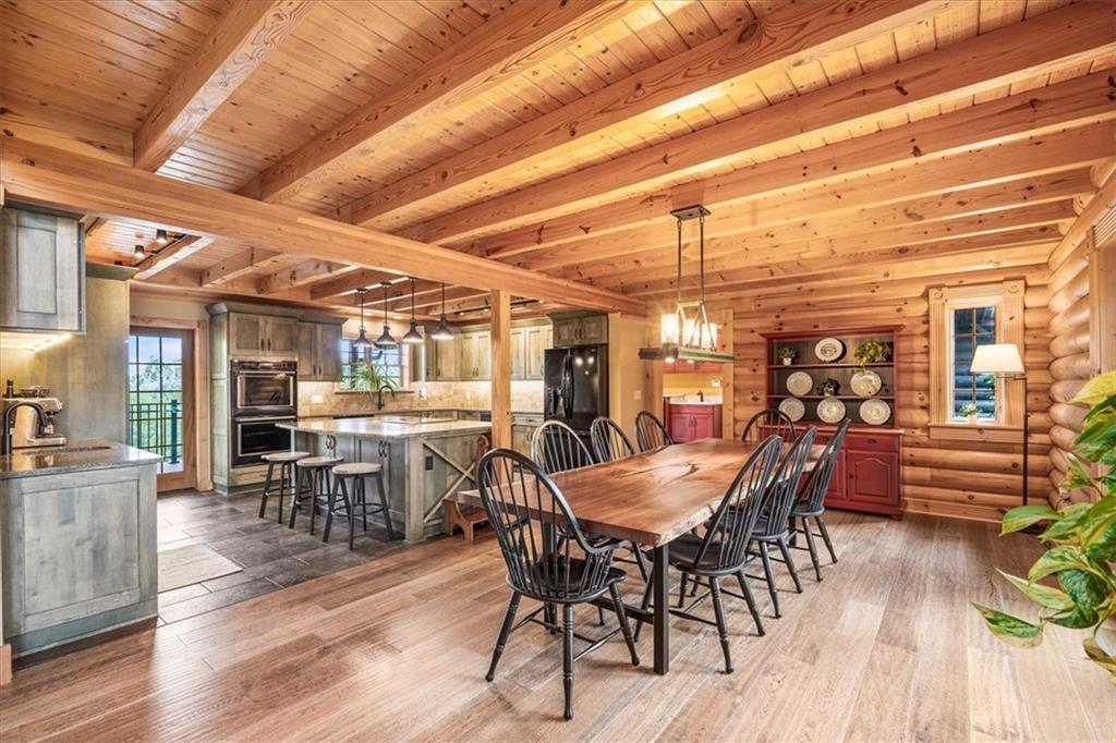 239 Christy Road Eighty Four, PA 15330 - Photo 8 of 50 a view of a dining room with furniture window and wooden floor