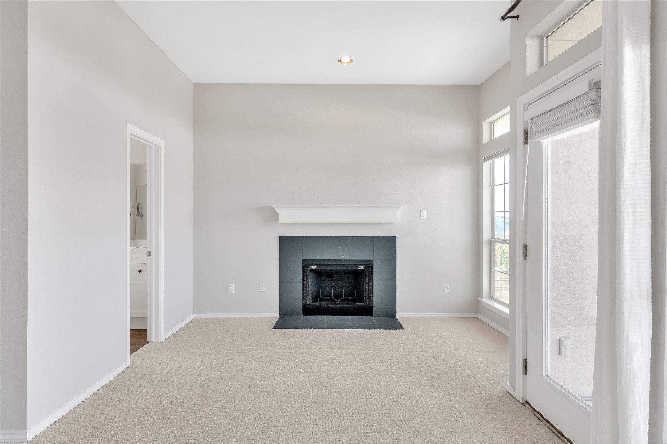 2918 Ranch Road 620 North, Unit 281 Austin, TX 78734 - Photo 12 of 32 a living room with furniture and a fireplace