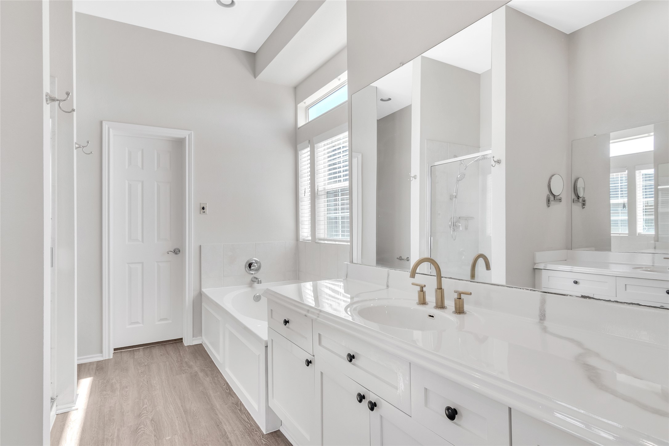 2918 Ranch Road 620 North, Unit 281 Austin, TX 78734 - Photo 14 of 32 a bathroom with double vanity sinks and a mirror