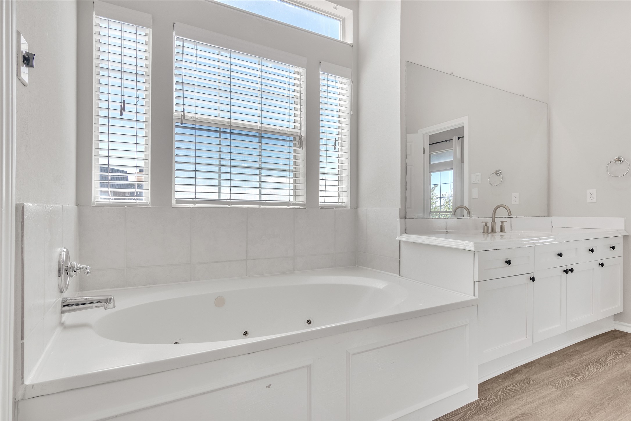 2918 Ranch Road 620 North, Unit 281 Austin, TX 78734 - Photo 16 of 32 a white bath tub sitting next to a white sink