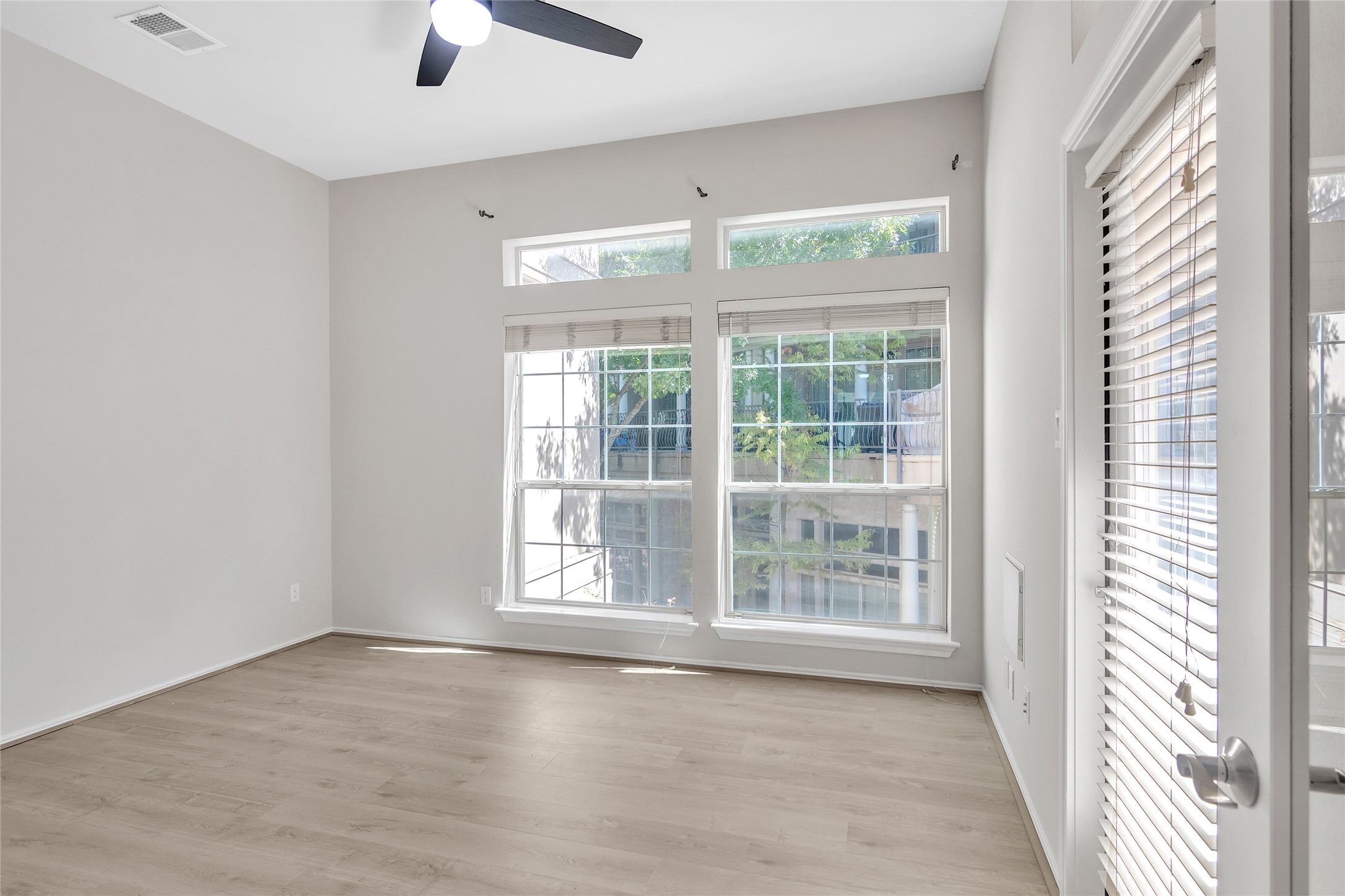 2918 Ranch Road 620 North, Unit 281 Austin, TX 78734 - Photo 18 of 32 a view of an empty room with a window and a ceiling fan
