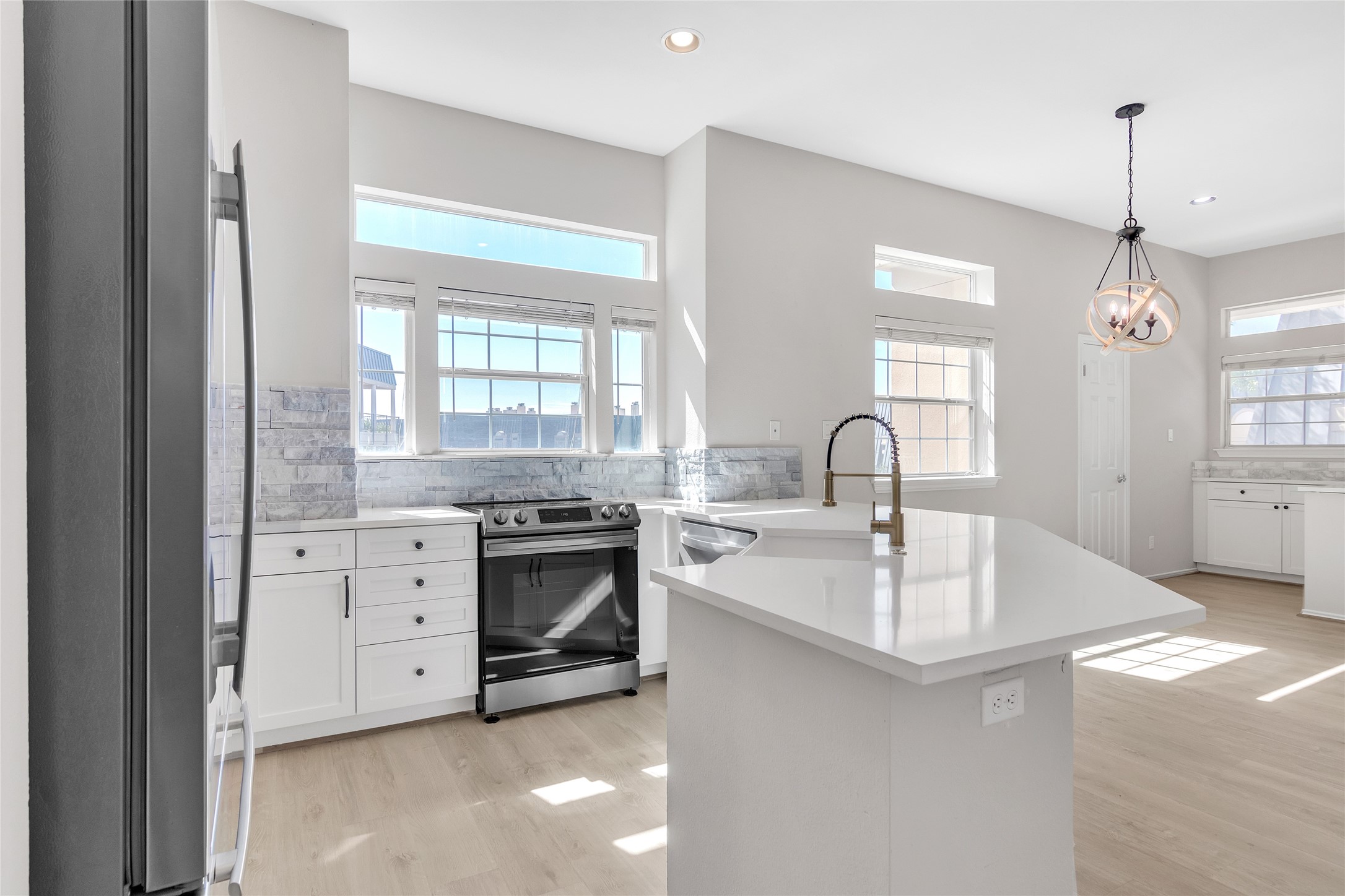 2918 Ranch Road 620 North, Unit 281 Austin, TX 78734 - Photo 3 of 32 a kitchen with cabinets a sink and appliances