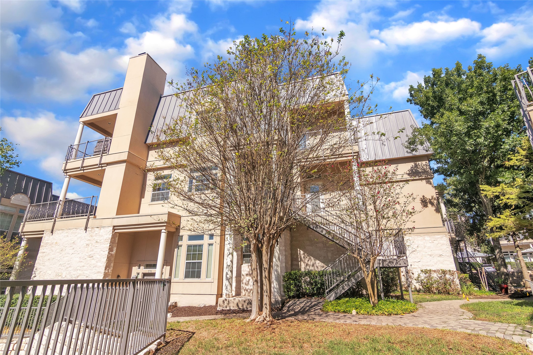 2918 Ranch Road 620 North, Unit 281 Austin, TX 78734 - Photo 32 of 32 front view of a house with a yard