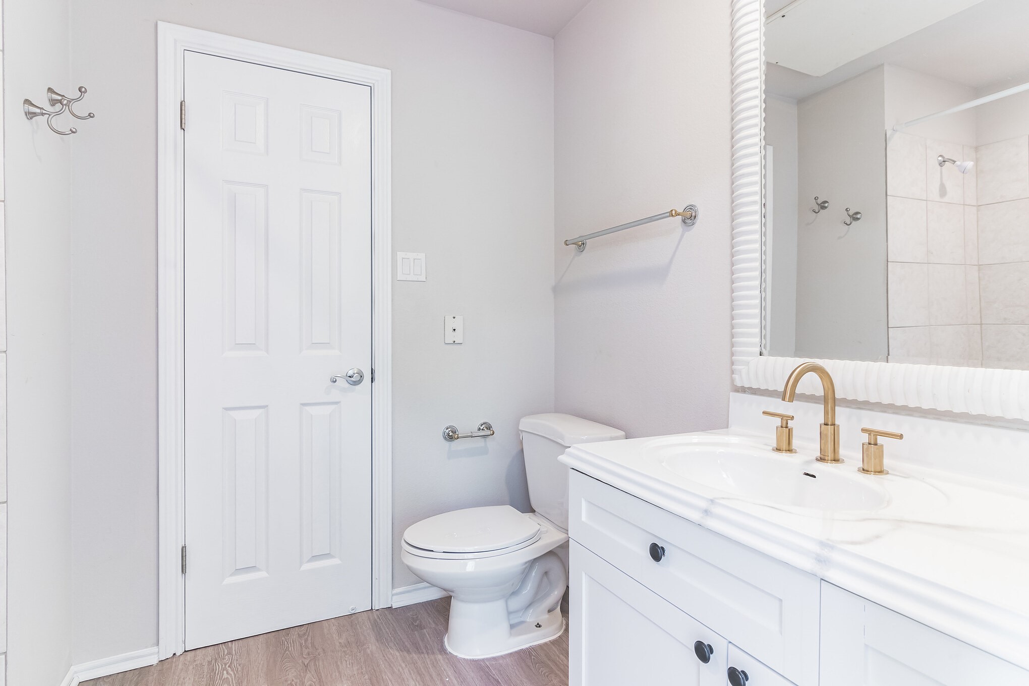 2918 Ranch Road 620 North, Unit 281 Austin, TX 78734 - Photo 5 of 32 a bathroom with a sink a toilet and shower