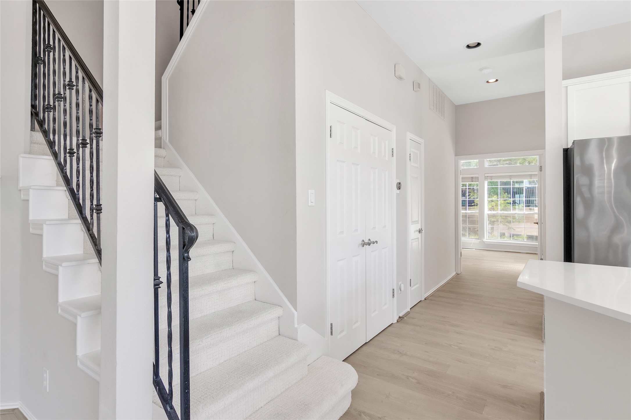 2918 Ranch Road 620 North, Unit 281 Austin, TX 78734 - Photo 10 of 32 a view of a hallway with wooden floor and entryway