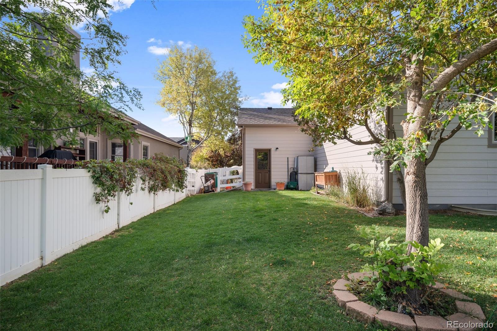 1731 Wales Drive Berthoud, CO 80513 - Photo 33 of 36 a view of backyard of house with green space