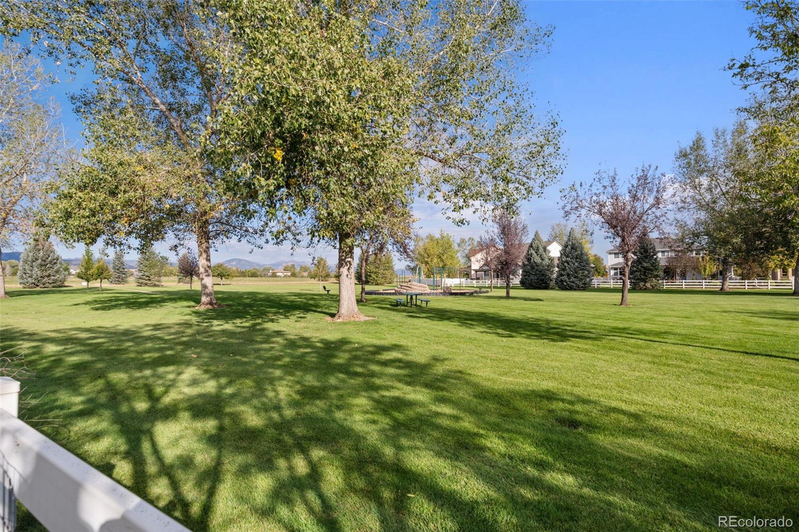 1731 Wales Drive Berthoud, CO 80513 - Photo 35 of 36 a view of a park with large trees