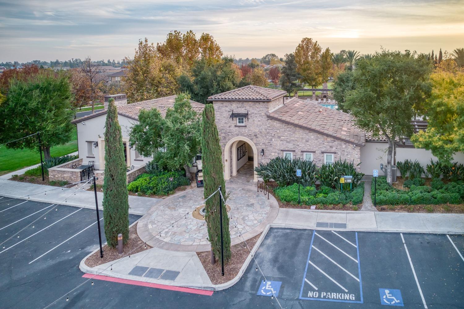 3994 Chessa Lane Clovis, CA 93619 - Photo 33 of 36 a front view of a house with garden