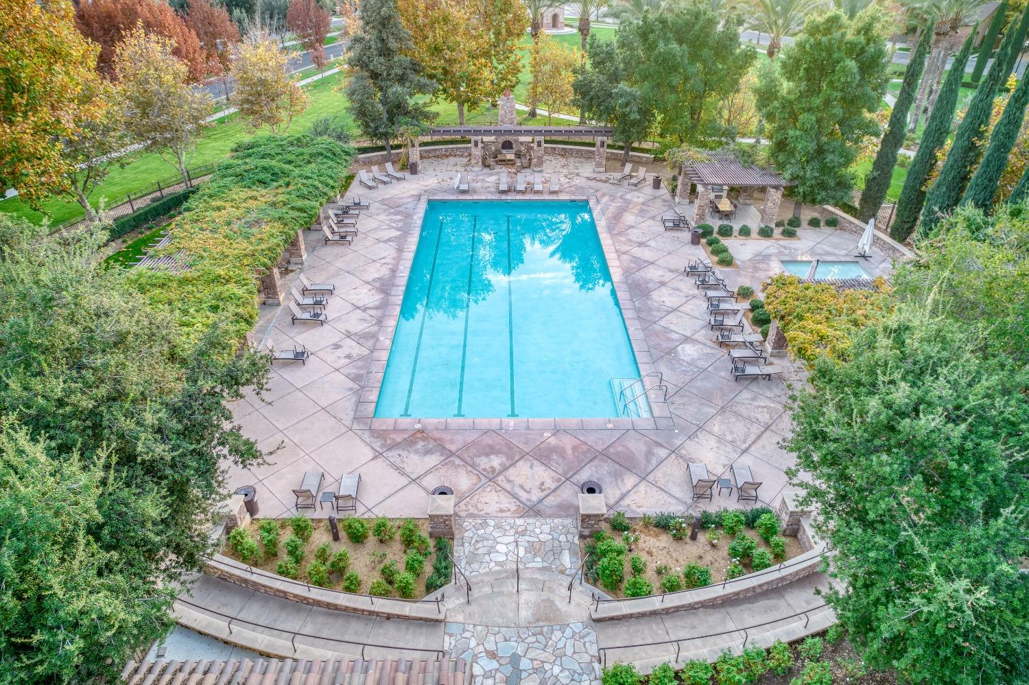 3994 Chessa Lane Clovis, CA 93619 - Photo 34 of 36 a view of swimming pool with a patio