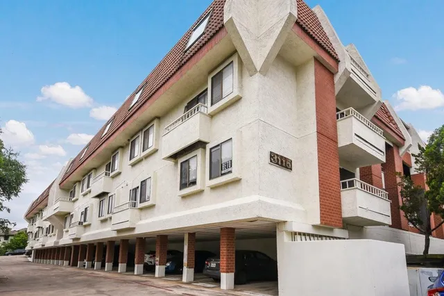 a view of a building with a street