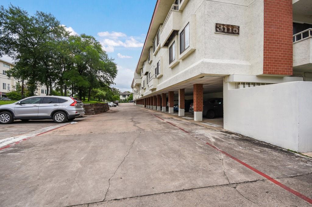 3115 Helms Street, Unit 301 Austin, TX 78705 - Photo 18 of 19 a view of street with parked cars