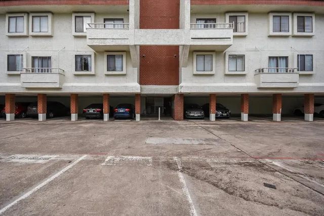 a view of a building with a street