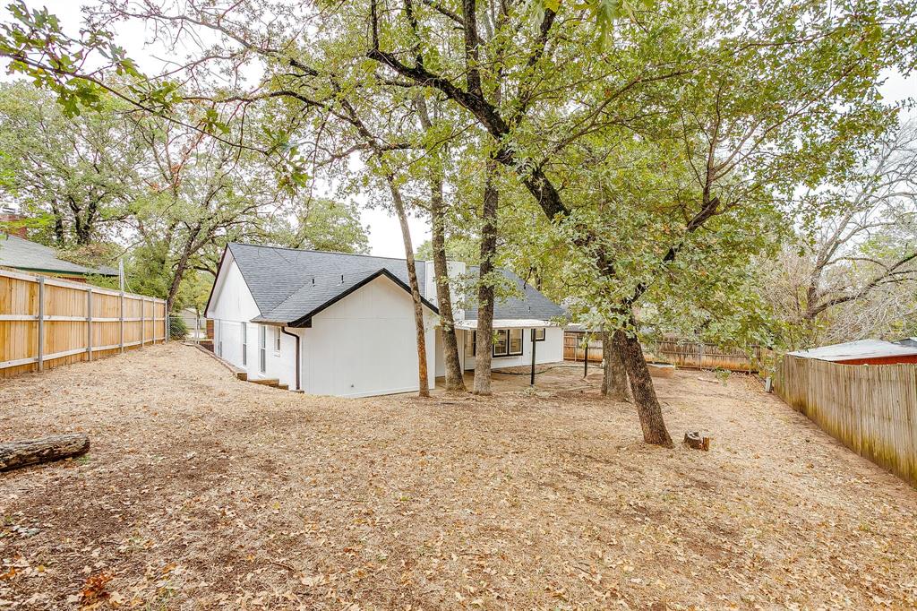 155 Ann Court Azle, TX 76020 - Photo 36 of 39 View of fenced backyard
