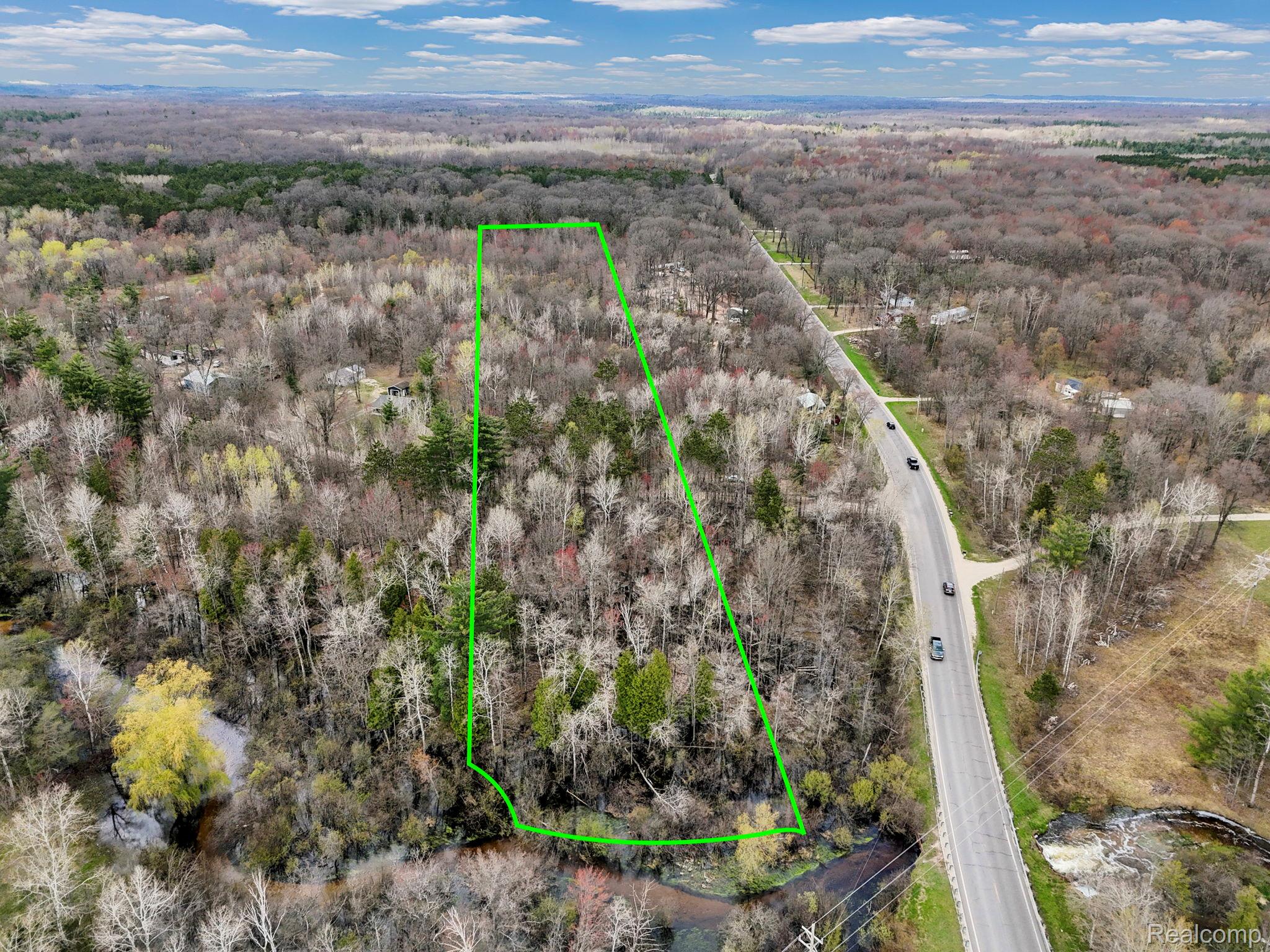 32 32 1/2 Road Cadillac, MI 49601 - Photo 1 of 17 DJI_20251226125804_0063_D.JPG